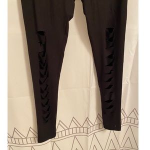 Black ripped style leggings from fabletics